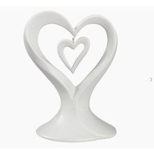 Load image into Gallery viewer, Wedding cake topper featuring white dangling double hearts | Elegant cake decoration | Heart-themed cake embellishment | Romantic wedding accent | Delicate double heart cake adornment
